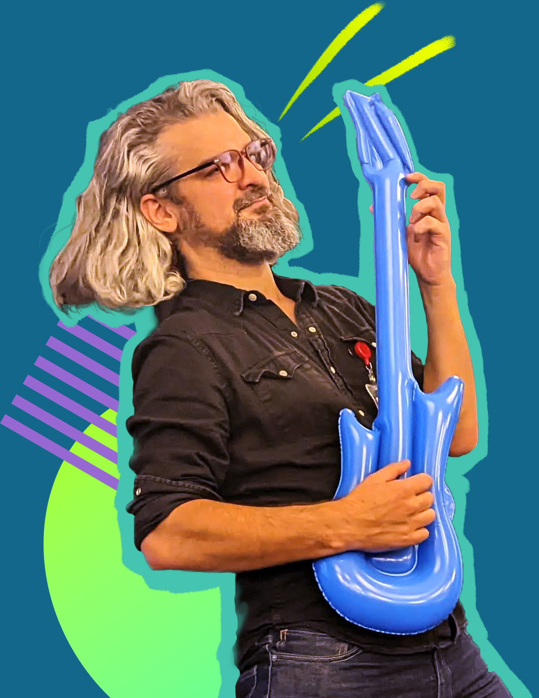 Playing an inflatable guitar at the Red Hat holidy party